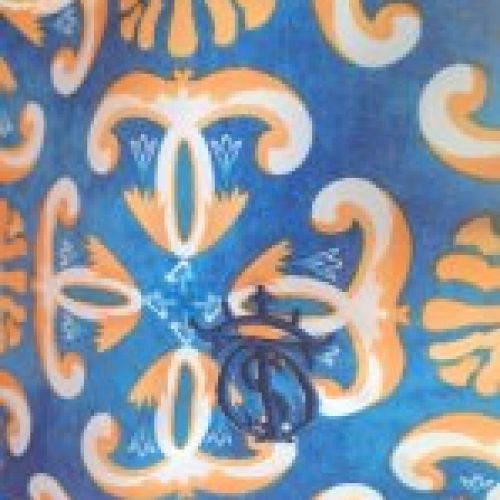 Bañador Azul eléctrico azulón con detalles en naranja de flores alegóricas y bordado del hierro de EL SOTO